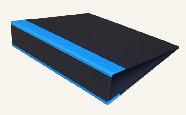 black folder with linen-reinforced edges in bright blue