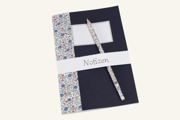 A5 notebook with pencil included, 16 sheets of fine writing paper, stapled binding, colored paper